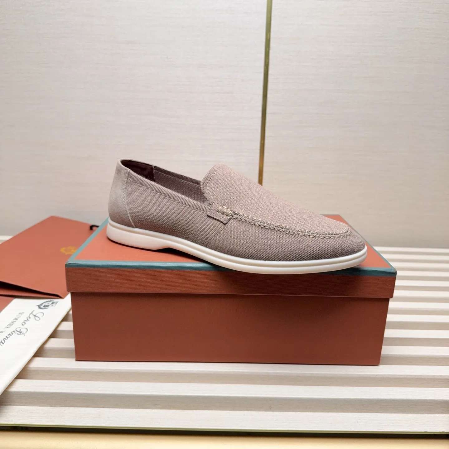 Men's Men's Shoes 💰400 Loro PIana moccasins are made of wish wool fabric. The upper is made of knitted fabric, made on a loom, and then attached to a rubber sole. The Rain System's water-repellent treatment enhances the shoe's functional design, while the suede details give the shoe a sense of elegance and sophistication. Made from Wish, fine wool from Australian and New Zealand Merino sheep
